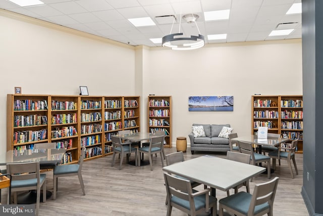 1300 Crystal Dr Unit 1408S, Arlington, VA 22202 - dining area featuring wood finished floors and a towering ceiling