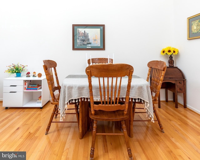 31142 Mills Chase Dr Unit 9, Lewes, DE 19958 - dining room featuring light wood-type flooring and baseboards