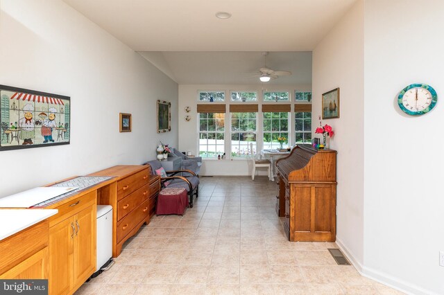31142 Mills Chase Dr Unit 9, Lewes, DE 19958 - hall with light tile patterned flooring, lofted ceiling, and baseboards