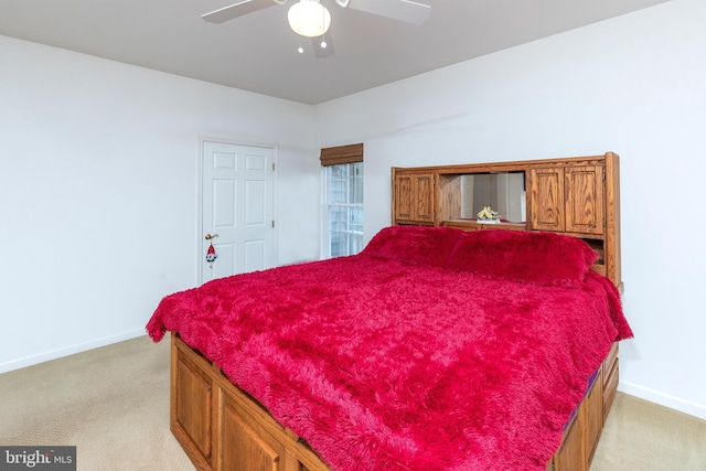 31142 Mills Chase Dr Unit 9, Lewes, DE 19958 - bedroom featuring light carpet, baseboards, and ceiling fan