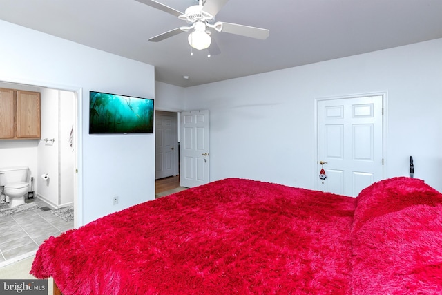 31142 Mills Chase Dr Unit 9, Lewes, DE 19958 - bedroom featuring ensuite bathroom, baseboards, and ceiling fan