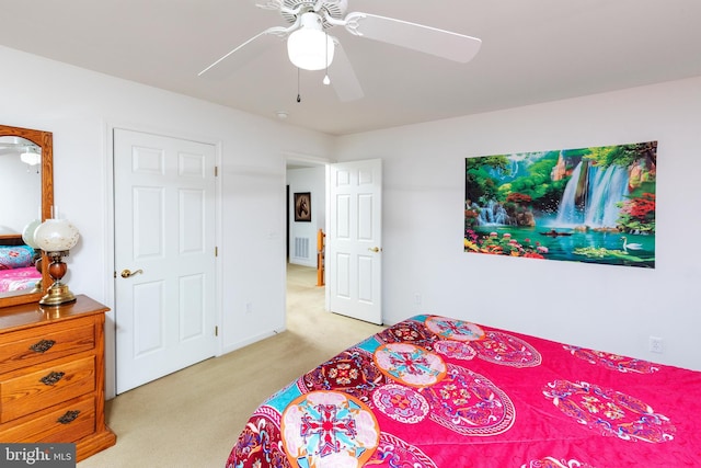 31142 Mills Chase Dr Unit 9, Lewes, DE 19958 - bedroom with light colored carpet and a ceiling fan