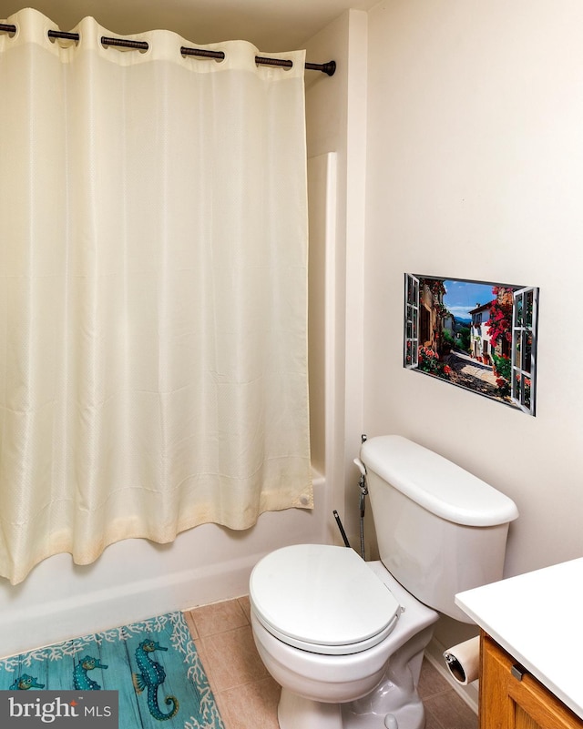 31142 Mills Chase Dr Unit 9, Lewes, DE 19958 - full bath with shower / bath combination with curtain, tile patterned flooring, vanity, and toilet