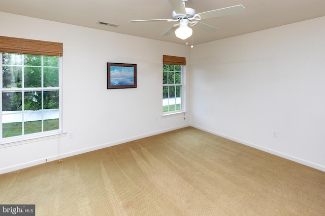 31142 Mills Chase Dr Unit 9, Lewes, DE 19958 - spare room with plenty of natural light and light carpet