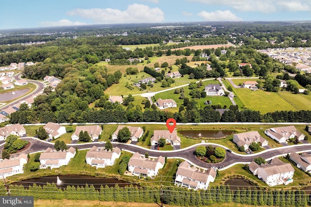 31142 Mills Chase Dr Unit 9, Lewes, DE 19958 - aerial perspective of suburban area with a nearby body of water