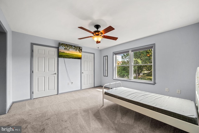 225 S Hanover St, Pottstown, PA 19465 - bedroom with carpet floors, baseboards, a ceiling fan, and a closet