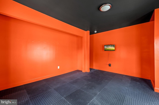 225 S Hanover St, Pottstown, PA 19465 - spare room with dark colored carpet and baseboards