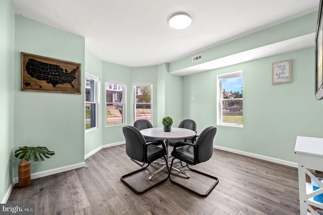 225 S Hanover St, Pottstown, PA 19465 - dining area featuring wood finished floors, baseboards, and plenty of natural light
