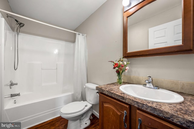225 S Hanover St, Pottstown, PA 19465 - bathroom with toilet, vanity, shower / bathtub combination with curtain, and wood finished floors