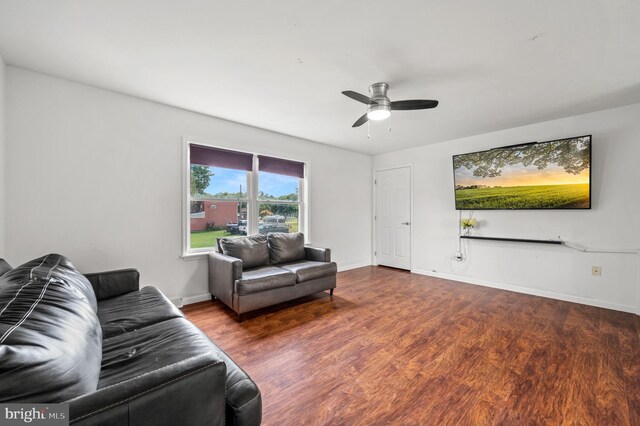 225 S Hanover St, Pottstown, PA 19465 - living room with wood finished floors, ceiling fan, and baseboards