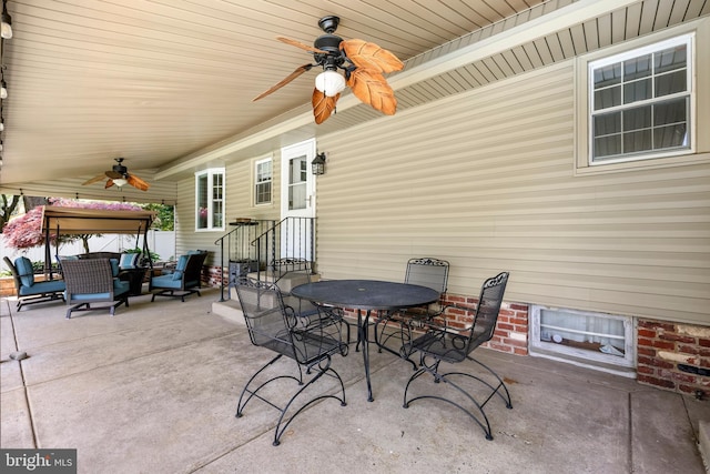 view of patio / terrace featuring a ceiling fan, outdoor dining space, and outdoor lounge area