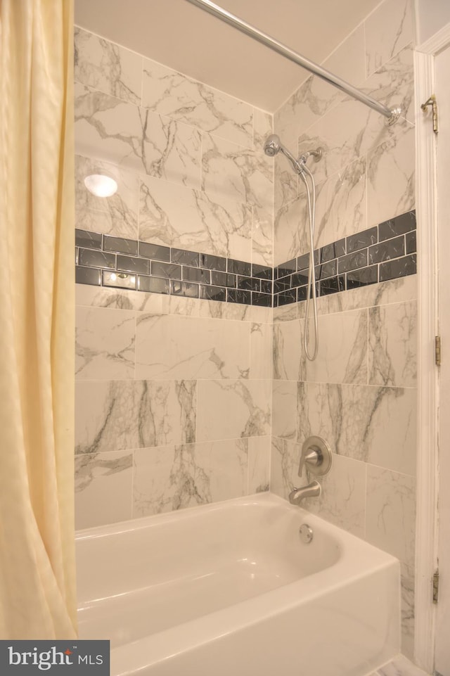 full bath featuring shower / tub combo