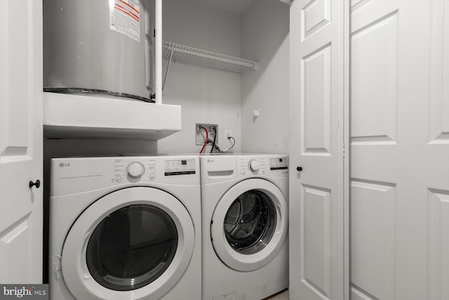 washroom featuring independent washer and dryer