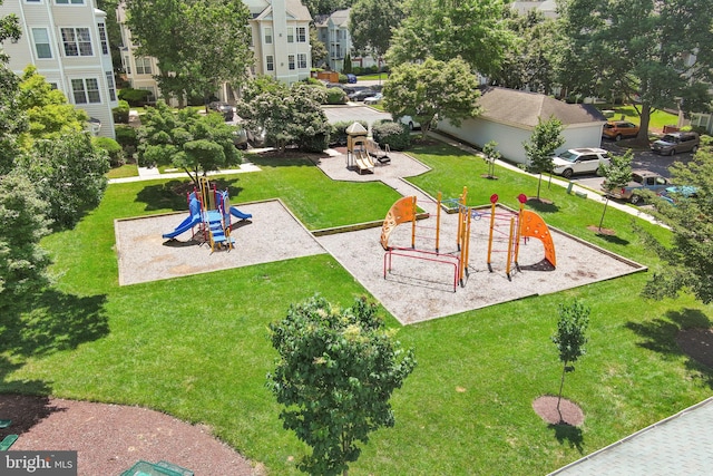 communal playground with a lawn
