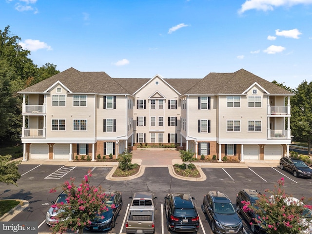 12708 Found Stone Rd Unit 3-304, Germantown, MD 20876 - view of building exterior with uncovered parking