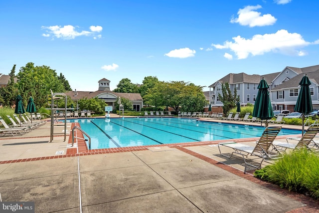 12708 Found Stone Rd Unit 3-304, Germantown, MD 20876 - community pool featuring a patio and a residential view
