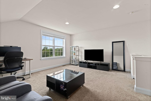 carpeted living area featuring baseboards, lofted ceiling, recessed lighting, and an office area