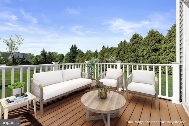 wooden deck featuring an outdoor living space