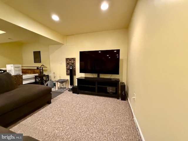 carpeted living room with baseboards and recessed lighting