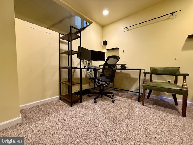 office space with carpet and baseboards
