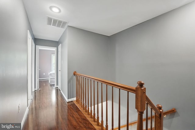 6410 Brass Button Ct, Centreville, VA 20121 - hall with an upstairs landing, hardwood / wood-style flooring, and baseboards
