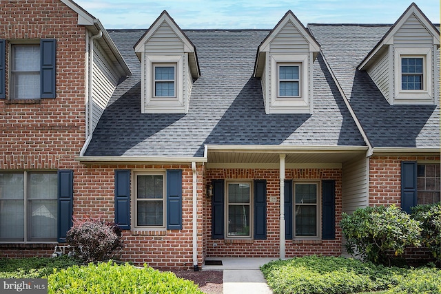125 Wyndham Way, Harrisburg, PA 17109 - view of front facade featuring a shingled roof and brick siding