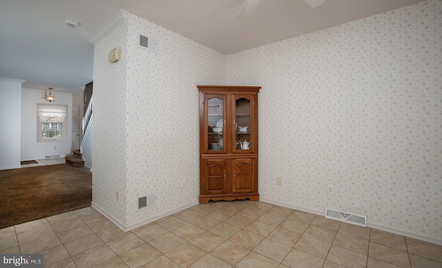 125 Wyndham Way, Harrisburg, PA 17109 - spare room with crown molding, light tile patterned floors, baseboards, and stairway