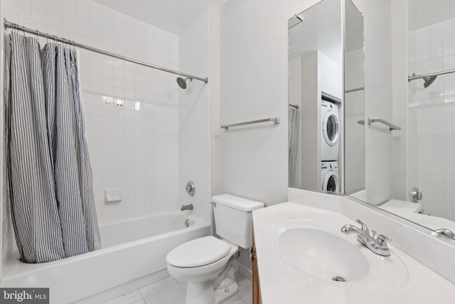 2204 Westcourt Ln Unit 122, Herndon, VA 20170 - full bathroom featuring estacked washer and dryer, shower / bath combo, toilet, tile patterned floors, and vanity