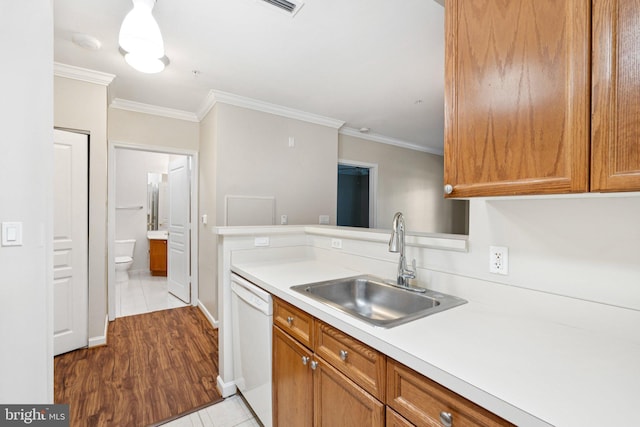 2204 Westcourt Ln Unit 122, Herndon, VA 20170 - kitchen with white dishwasher, a sink, ornamental molding, light countertops, and light tile patterned flooring