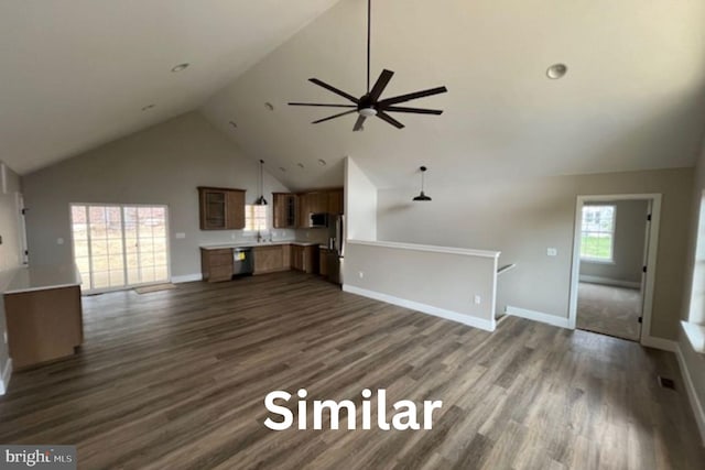 399REAR Beck Mill Rd, Hanover, PA 17331 - unfurnished living room with high vaulted ceiling, ceiling fan, dark wood-style flooring, and baseboards