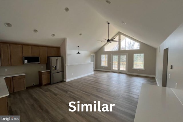399REAR Beck Mill Rd, Hanover, PA 17331 - kitchen with stainless steel refrigerator with ice dispenser, wood finished floors, ceiling fan, baseboards, and vaulted ceiling