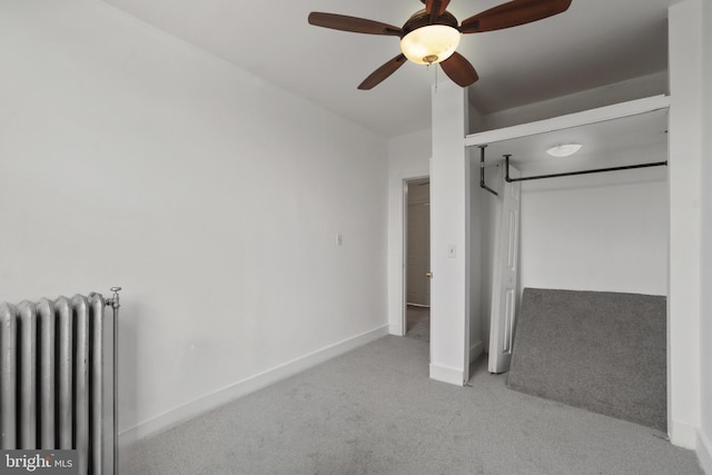 1609 E 33rd St, Baltimore, MD 21218 - unfurnished bedroom with radiator, carpet floors, baseboards, and a closet