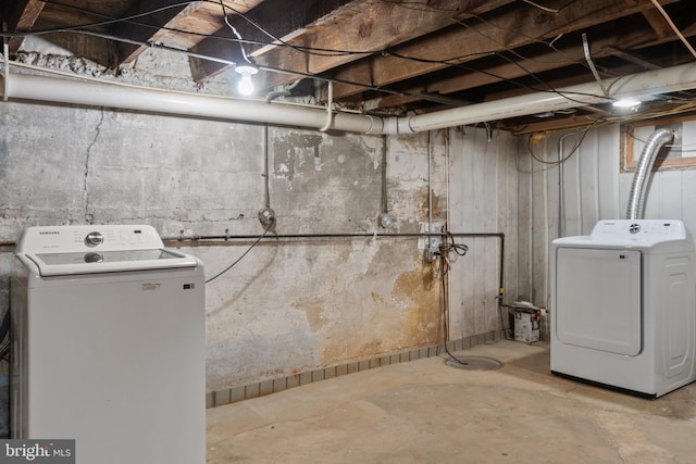 1609 E 33rd St, Baltimore, MD 21218 - unfinished basement with washer and clothes dryer