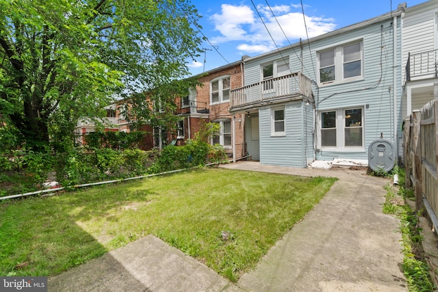 1609 E 33rd St, Baltimore, MD 21218 - rear view of property featuring a balcony