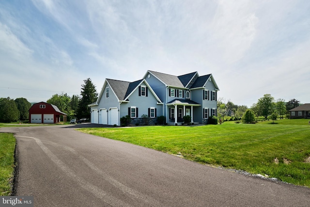 12 N Parsons Dr, Mill Hall, PA 17751 - view of front of home featuring a front lawn and an outbuilding