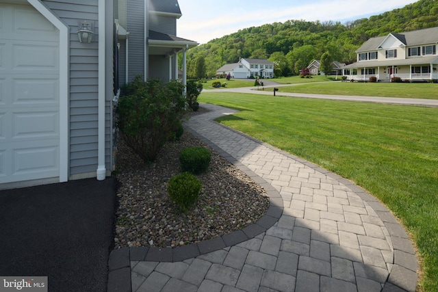 12 N Parsons Dr, Mill Hall, PA 17751 - view of property's community featuring a lawn and a garage