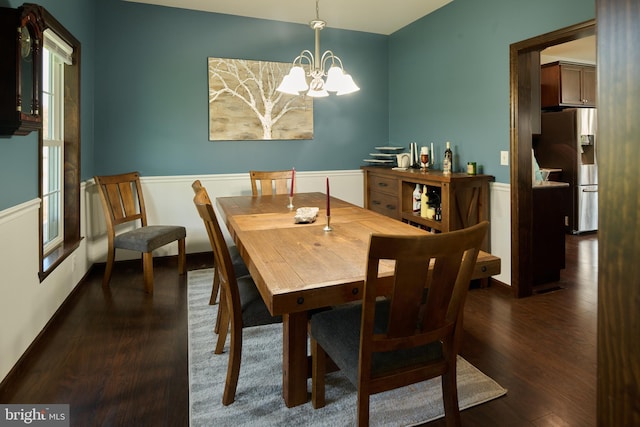 12 N Parsons Dr, Mill Hall, PA 17751 - dining area featuring a wainscoted wall, dark wood-style floors, and a chandelier