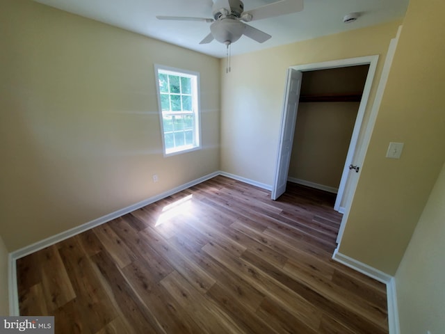 4302 Messick Rd, Rhodesdale, MD 21659 - unfurnished bedroom with wood finished floors, baseboards, a closet, and ceiling fan