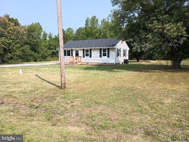 4302 Messick Rd, Rhodesdale, MD 21659 - view of front of home featuring a front lawn, crawl space, and central AC