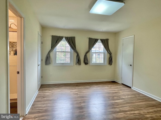 7972 Lakecrest Dr, Greenbelt, MD 20770 - empty room featuring wood finished floors and baseboards