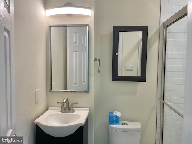 7972 Lakecrest Dr, Greenbelt, MD 20770 - bathroom featuring vanity, toilet, and a tile shower