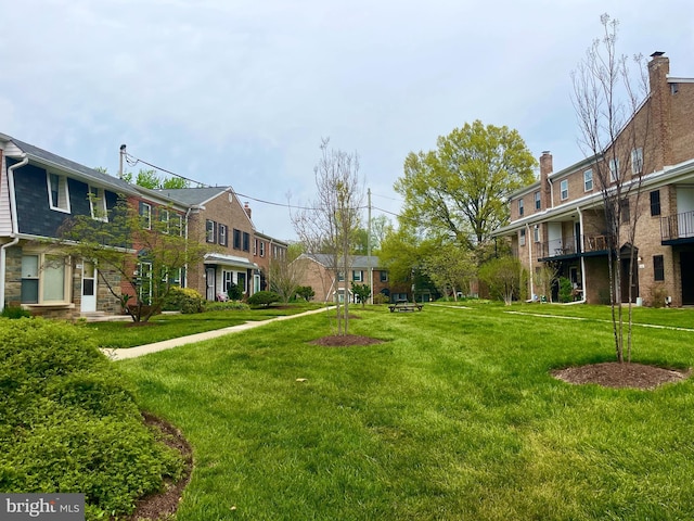 7972 Lakecrest Dr, Greenbelt, MD 20770 - view of community featuring a yard and a residential view