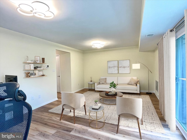7972 Lakecrest Dr, Greenbelt, MD 20770 - living room with wood finished floors and baseboards
