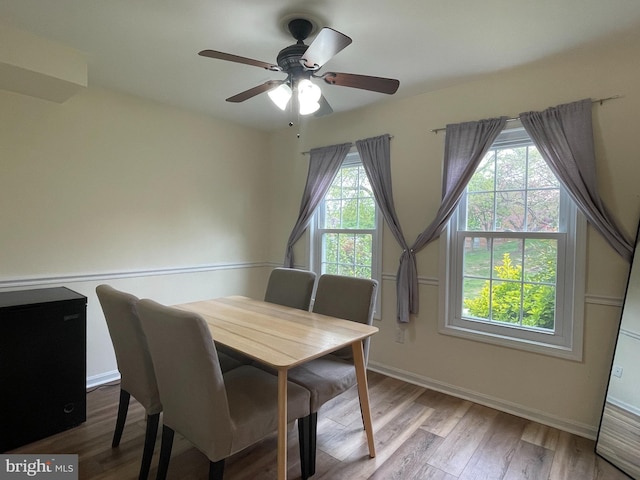 7972 Lakecrest Dr, Greenbelt, MD 20770 - dining room with wood finished floors, ceiling fan, and baseboards