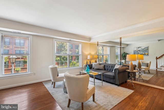 810 N Fayette St, Alexandria, VA 22314 - living room with baseboards, hardwood / wood-style flooring, crown molding, and stairway