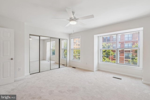810 N Fayette St, Alexandria, VA 22314 - unfurnished bedroom featuring carpet flooring, baseboards, a closet, and ceiling fan
