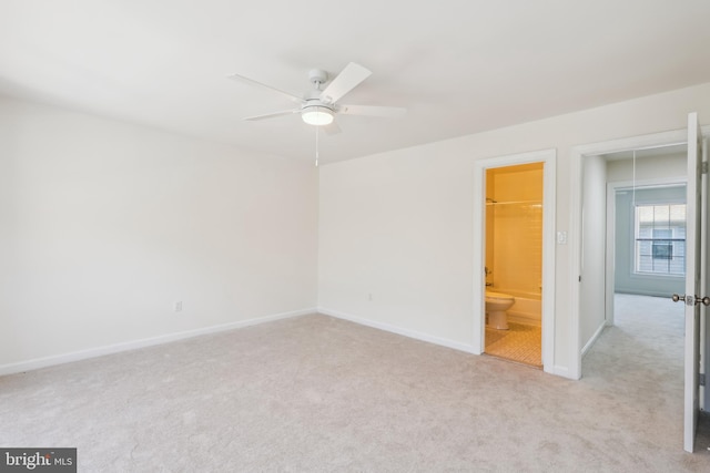 810 N Fayette St, Alexandria, VA 22314 - unfurnished bedroom with carpet floors, baseboards, and ceiling fan