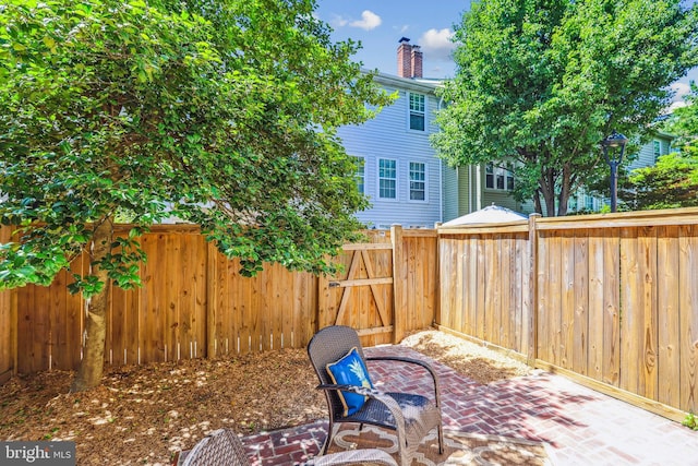 810 N Fayette St, Alexandria, VA 22314 - fenced backyard with a patio area