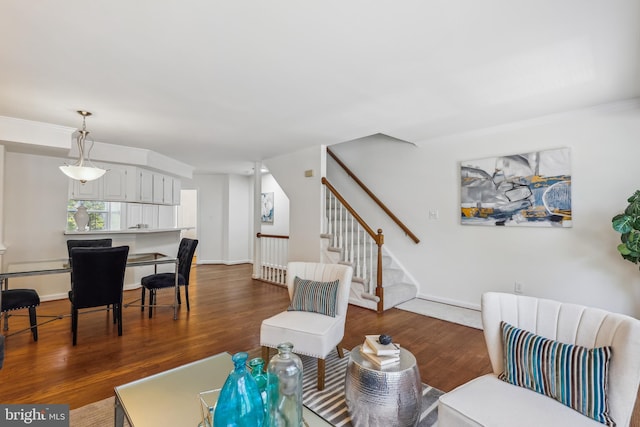 810 N Fayette St, Alexandria, VA 22314 - living room featuring stairs and dark wood-type flooring