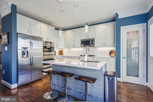 801 Skippers Ln, Annapolis, MD 21401 - kitchen featuring stainless steel appliances, dark wood-style flooring, ornamental molding, white cabinets, and recessed lighting